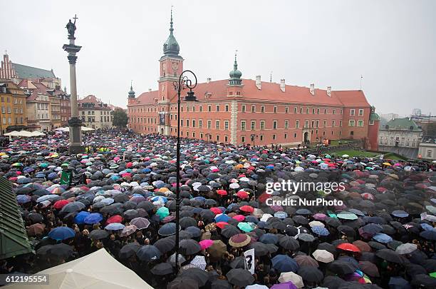 People attend the anti-government, pro-abortion demonstration on the Castle squar in Warsaw. 03 October Poland