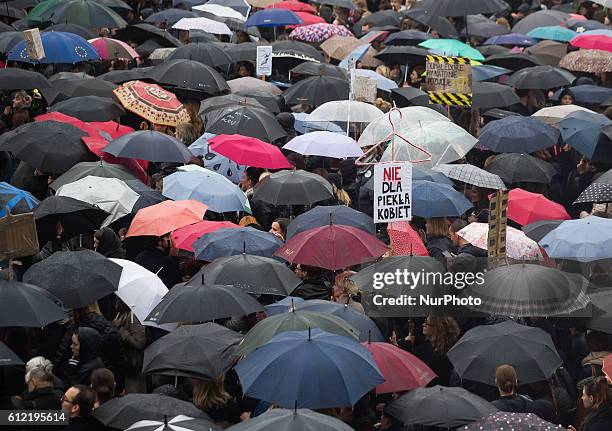 People attend the anti-government, pro-abortion demonstration on the Castle squar in Warsaw. 03 October Poland