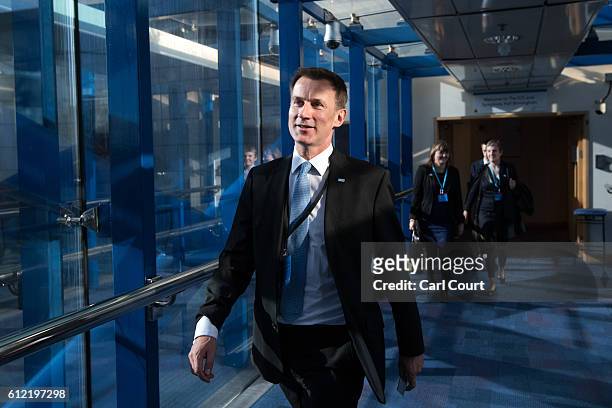Secretary of State for Health, Jeremy Hunt, walks to his hotel from the conference centre on the second day of the Conservative Party Conference 2016...