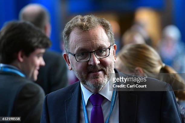 Scottish Secretary, David Mundell, walks to the conference centre on the second day of the Conservative Party Conference 2016 at the ICC Birmingham...