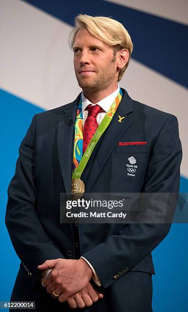 Andrew Triggs Hodge, British rower and a triple Olympic Gold Medallist speaks on stage on the second day of the Conservative Party Conference 2016 at...