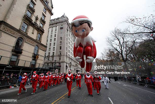 Elf on a Shelf floats along Central Park West during the Macy's Thanksgiving Day Parade in New York, November 27, 2014