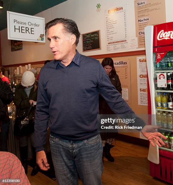 Republican presidential candidate and former MA Governor Mitt Romney campaigning a burrito restaurant in Concord, NH on the 3rd day of his NH bus...