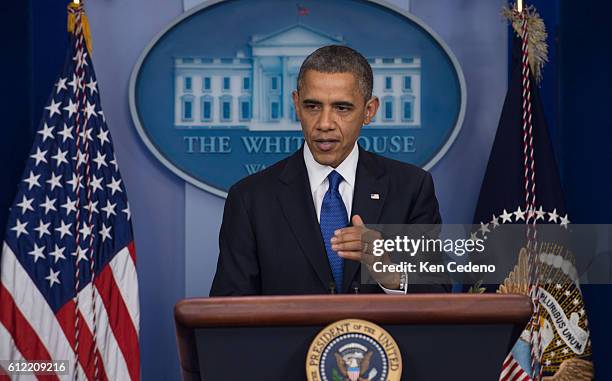 President Barack Obama speaks about the fiscal cliff in the James Brady Briefing Room of the White House in Washington, DC. December 21, 2012. Photo...