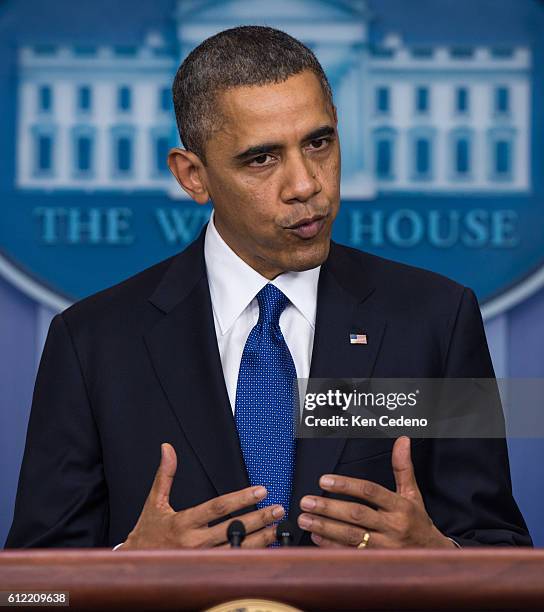 President Barack Obama speaks about the fiscal cliff in the James Brady Briefing Room of the White House in Washington, DC. December 21, 2012. Photo...