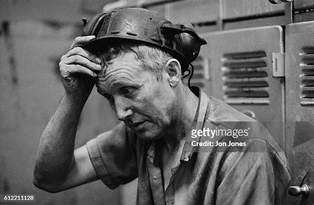 Miner from Bentley colliery sits in the changing rooms. The government recently announced it is planning to close a third of Britain's deep coal...