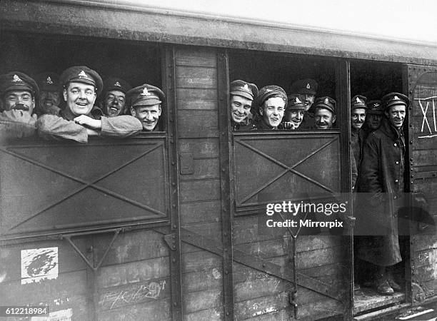 The first Christmas leave train seen here leaving Northern Italy. The troops are happy even if the mode of transport is somewhat crude. December 1918