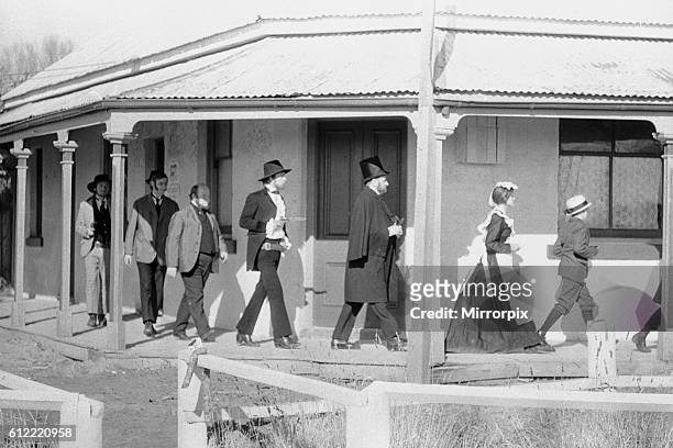 Rolling Stones singer Mick Jagger as Ned Kelly marching hostages around the veranda of the bank during the filming of Ned Kelly in Bugendore,...