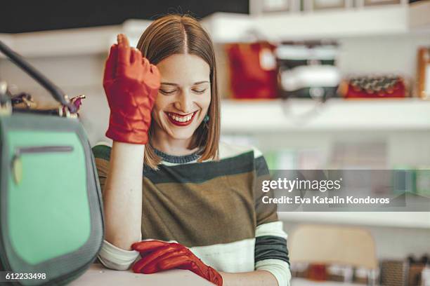 red leather gloves - leather glove stock pictures, royalty-free photos & images