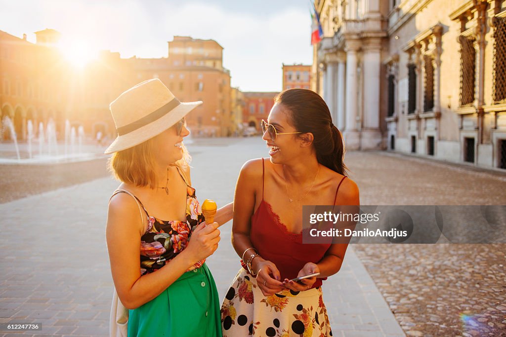 Two beautiful women having fun in the city