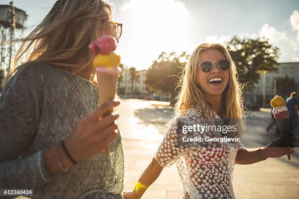 having fun in the city - eating icecream stock pictures, royalty-free photos & images