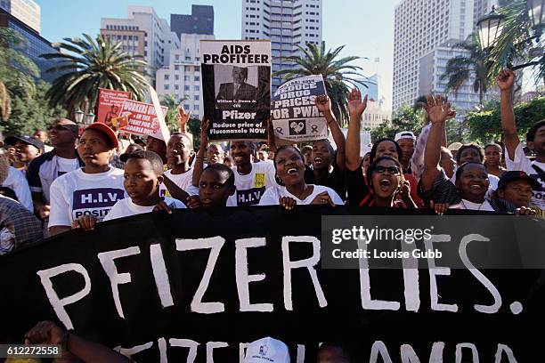 People protests against the difficulty of drug access due to high prices at the opening of the 13th International AIDS Conference.