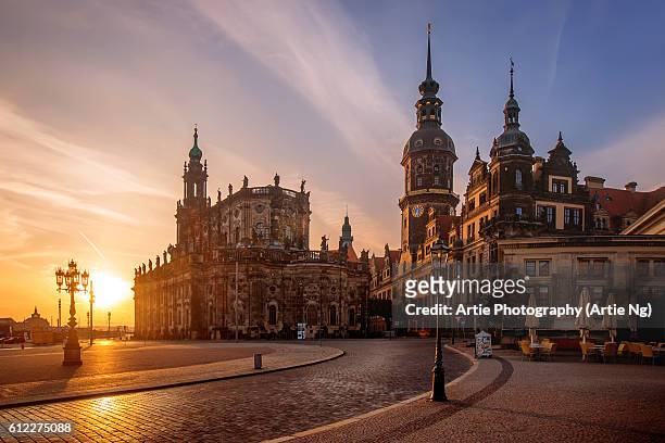 sunrise view of dresden cathedral (katholische hofkirche) and dresden castle (dresdner schloss) at theaterplatz, dresden, germany - saxony stock pictures, royalty-free photos & images