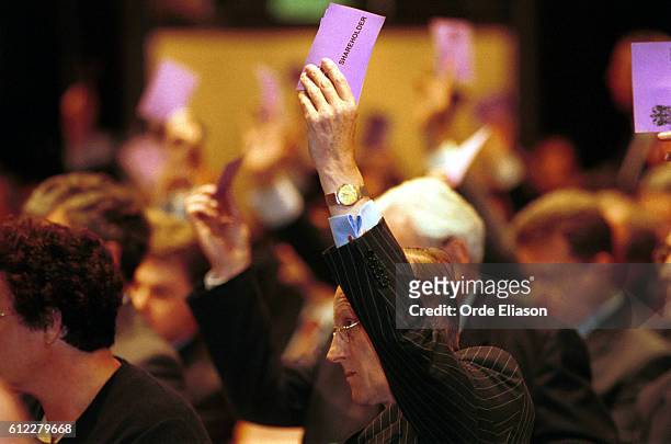 Shareholders vote during the London Stock Exchange AGM at the InterContinental Hotel.