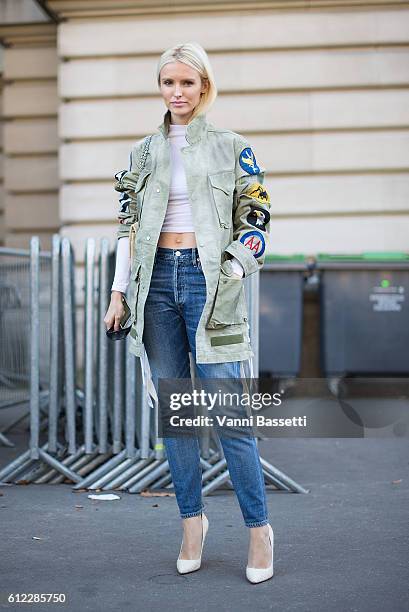 Guest poses after the Giambattista Valli show at the Grand Palais during Paris Fashion Week Womenswear SS17 on October 3, 2016 in Paris, France.