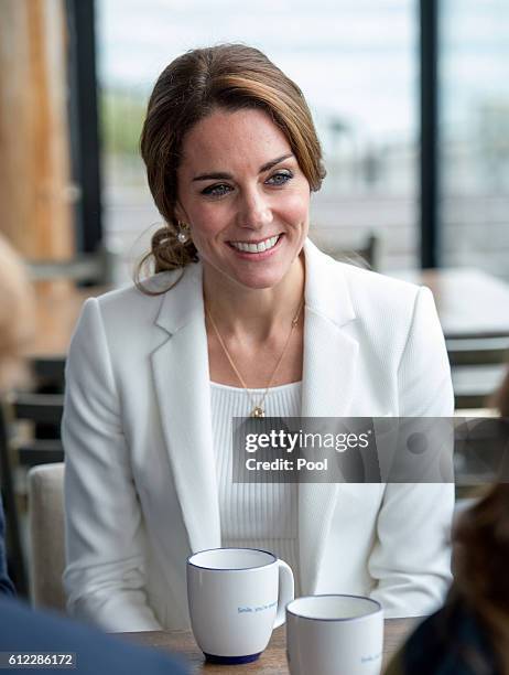 Catherine, Duchess of Cambridge visits a local cafe to learn about Kelty Mental Health Resource on October 1, 2016 in Victoria, Canada.