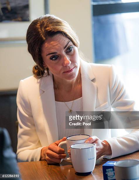 Catherine, Duchess of Cambridge visits a local cafe to learn about Kelty Mental Health Resource on October 1, 2016 in Victoria, Canada.