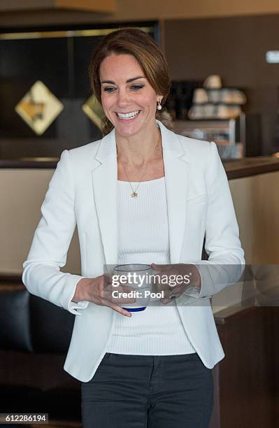 Catherine, Duchess of Cambridge visits a local cafe to learn about Kelty Mental Health Resource on October 1, 2016 in Victoria, Canada.