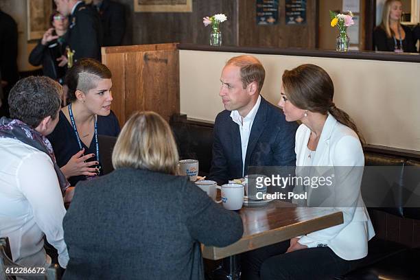 Prince William, Duke of Cambridge and Catherine, Duchess of Cambridge visits a local cafe to learn about Kelty Mental Health Resource on October 1,...