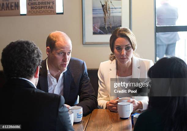 Prince William, Duke of Cambridge and Catherine, Duchess of Cambridge visits a local cafe to learn about Kelty Mental Health Resource on October 1,...