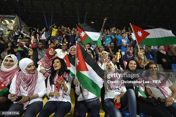 Female Jordan fan's sing for their team during the FIFA U-17 Women's World Cup Jordan 2016 Group A match between Jordan and Mexico at Al Hassan...