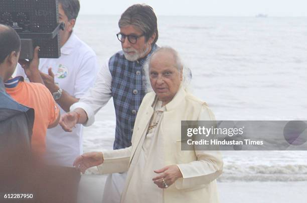Bollywood actor Amitabh Bachchan and Hindustani classical singer Pandit Jasraj during the ‘NDTV - Dettol Banega Swachh India’ cleanliness drive at...