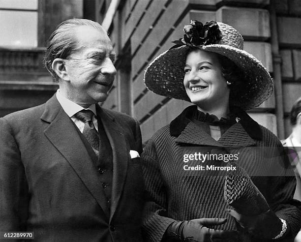 American millionaire J. Paul Getty and his English solicitor, Robina Lund, arriving at Burlington House, London, for a private view of the Royal...