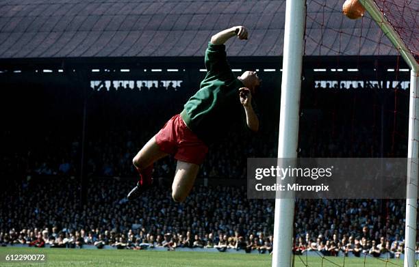Liverpool 2 v Manchester City 1. Liverpool goalkeeper Tommy Lawrence dives to try and stop a shot from City's Francis Lee which hits the bar. 10th...