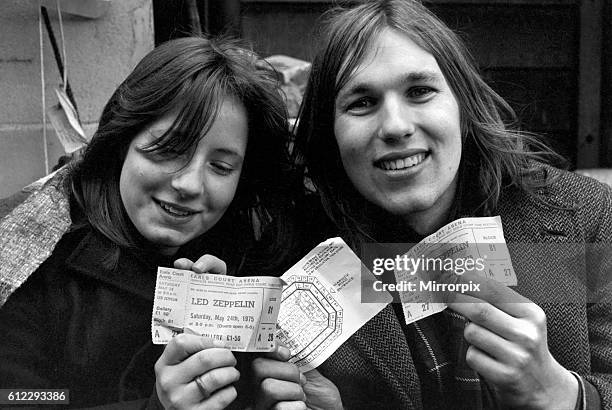 Kim Evans left and Janet Good pictured this morning after waiting all night to buy their tickets. March 1975 75-01455-003