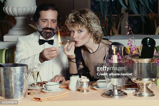 French actor, director and producer Jean Yanne and his partner actress Mimi Coutelier.