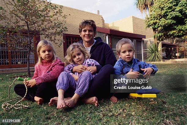 Olympic runner Zola Budd Pieterse with her children, five year old Lisa Pieterse and three year old twins Michael and Azelle Pieterse.