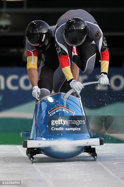Andre Lange und Kevin Kuske GER 1 2 er Bob Männer two men bobsleigh Olympische Winterspiele in Vancouver 2010 Kanada olympic winter games Vancouver...