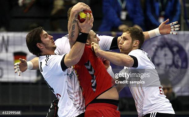 Michael Haaß , Oliver Roggisch , Steffen Weinhold , Mladen Rakcevic Handball Männer Weltmeisterschaft : Deutschland - Montenegro mens handball...