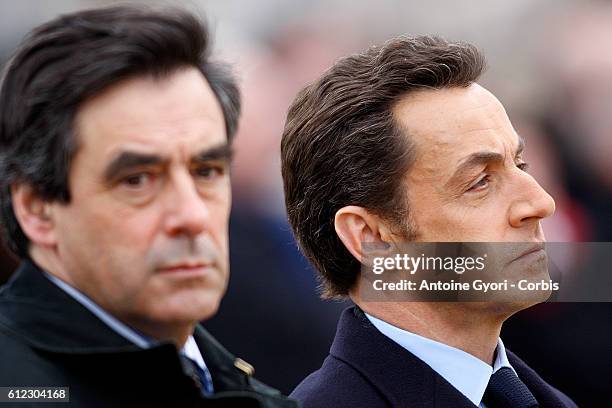 French President Nicolas Sarkozy and Francois Fillon,during a military tribute to the 8.4 million Frenchmen who fought in the World War I,in a solemn...