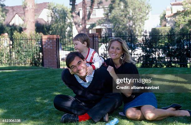 American director, screenwriter and producer Oliver Stone, his wife Elizabeth Burkit Cox and their son Sean in their Los Angeles home.