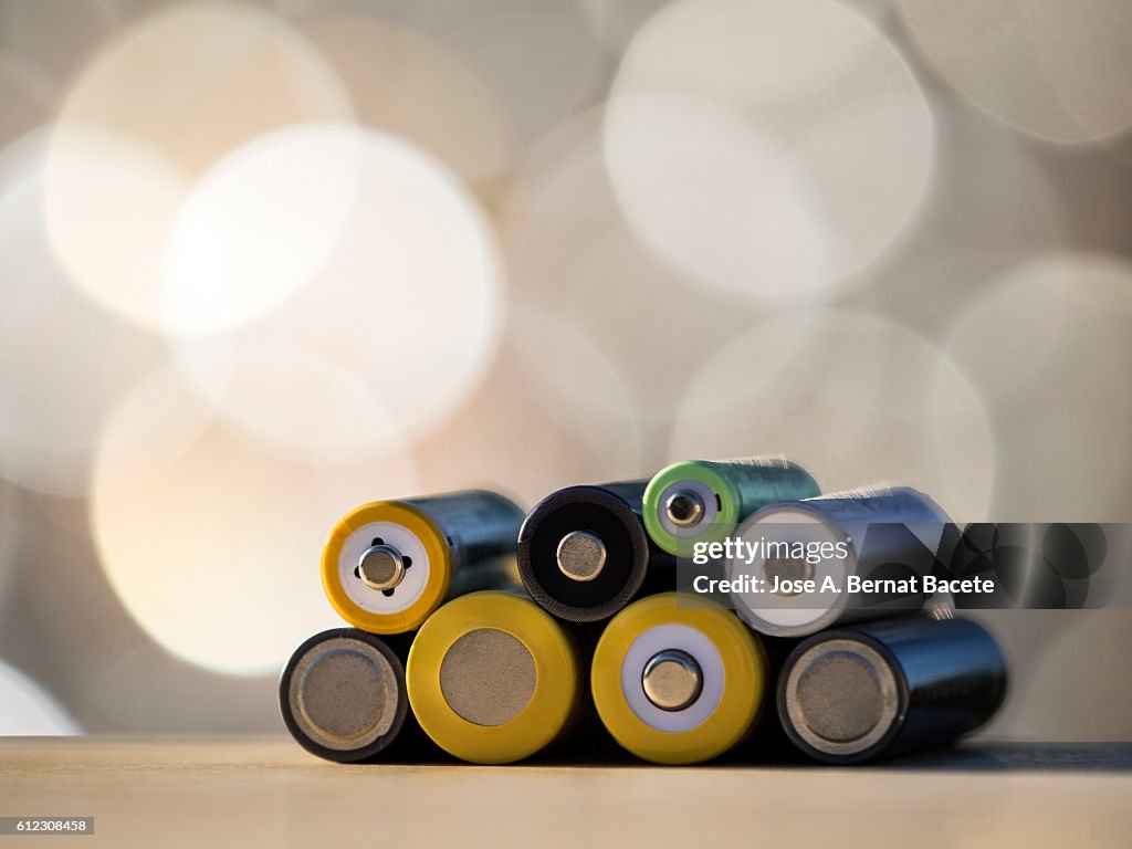 Heap of rechargeable batteries of differentes sizes. NiMH rechargeable.
