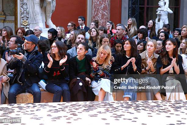 Loic Prigent, Granddaughters of Sonia Rykiel ; Salome Burstein, Tatiana Burstein and Lola Burstein; Emmanuelle Alt, guest and Rainey Qualley attend...