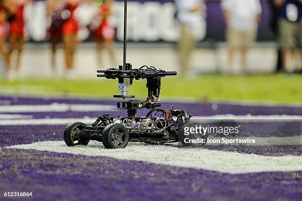 Remote control car carrying a 360 degree camera zips around in the end zone during the game between the TCU Horned Frogs and the Oklahoma Sooners at...