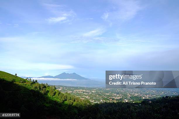 clear blue sky over top of mt salak. puncak pass, west java. - puncak pass stock pictures, royalty-free photos & images