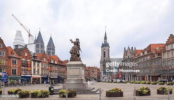 grand place and belfry of tournai and the statue of christine de lalaing - トゥルネー ストックフォトと画像