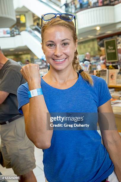 Alice Ford displays wrist band during the Bruce Springsteen fant event for "Born To Run" at Barnes & Noble at The Grove on October 3, 2016 in Los...