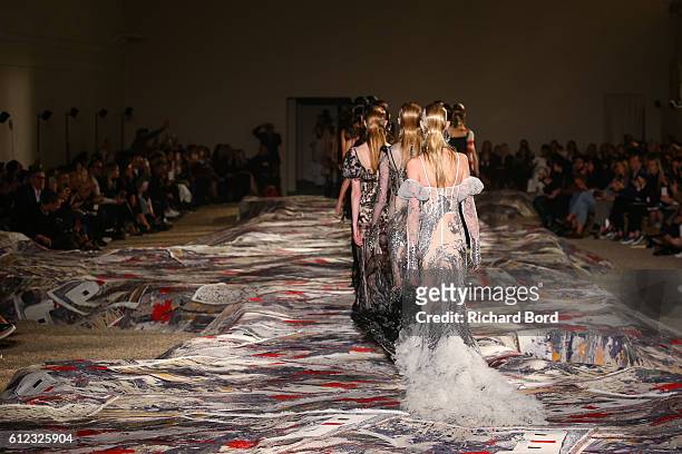 Models walk the runway during the Alexander McQueen show as part of the Paris Fashion Week Womenswear Spring/Summer 2017 at "Orangerie du Senat" on...