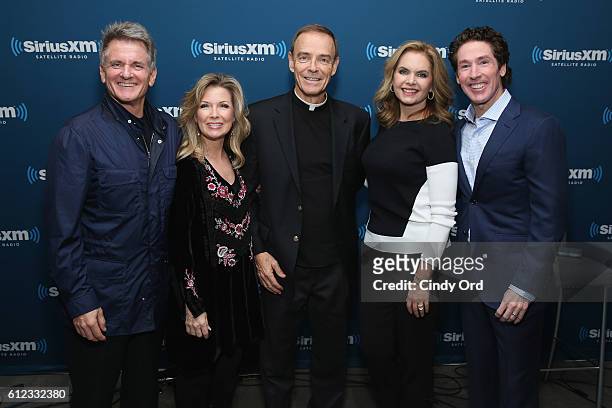 Laurie Crouch, Matt Crouch, Fr. Ed Leahy, Victoria Osteen and Joel Osteen participate in 'Joel Osteen Live' featuring Joel and Victoria Osteen with...