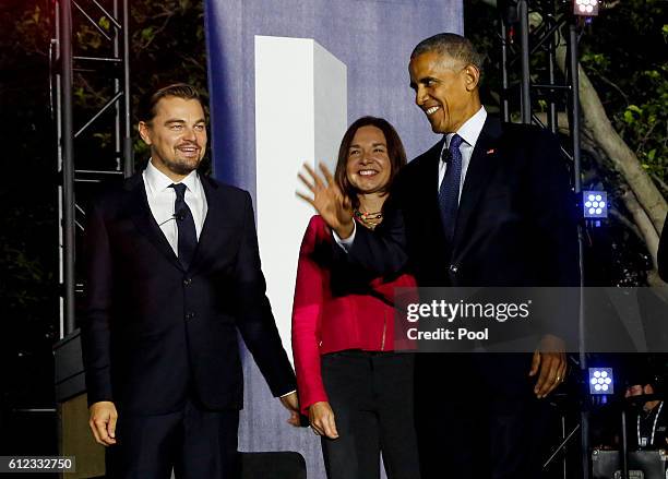 President Barack Obama, Leonardo DiCaprio and Dr. Katharine Hayhoe arrive at a panel discussion on climate change as part of the White House South by...