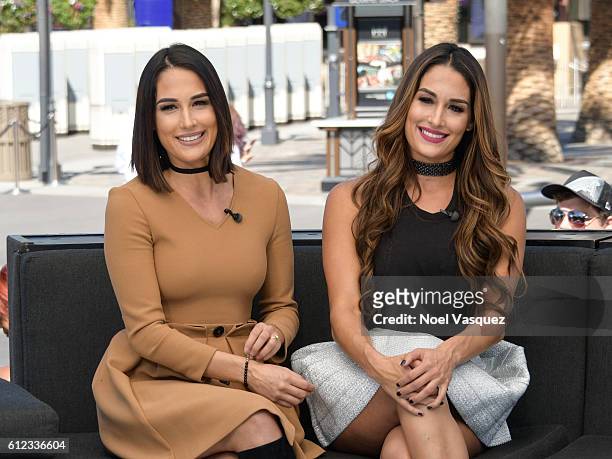 Brie Bella and Nikki Bella visit "Extra" at Universal Studios Hollywood on October 3, 2016 in Universal City, California.