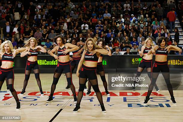 The Toronto Raptors dance team performs against the Denver Nuggets on October 3, 2016 at the Scotiabank Saddledome in Calagary, Alberta, Canada. NOTE...