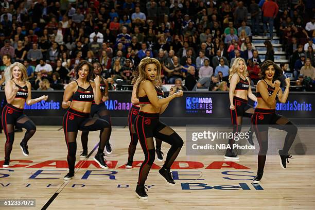 The Toronto Raptors dance team performs against the Denver Nuggets on October 3, 2016 at the Scotiabank Saddledome in Calagary, Alberta, Canada. NOTE...