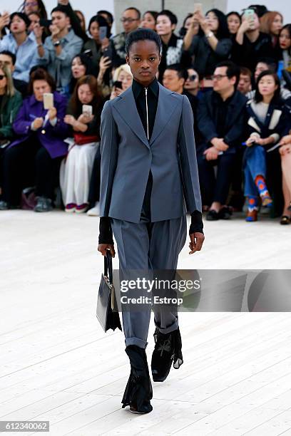 Model walks the runway during the Celine designed by Phoebe Philo show as part of the Paris Fashion Week Womenswear Spring/Summer 2017 on October 2,...
