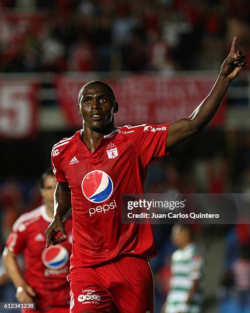 Efrain Cortes of America de Cali celebrates after scoring the second goal of his team during a match between America de Cali and Valledupar as part...