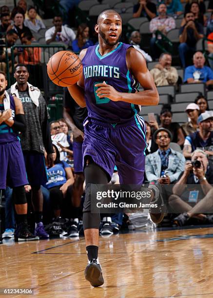 Rasheed Sulaimon of the Charlotte Hornets handles the ball against the Dallas Mavericks on October 3, 2016 at the American Airlines Center in Dallas,...